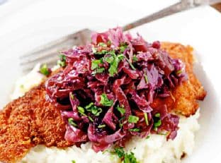 Chicken Milanese with Truffle Infused Potatoes and Braised Cabbage